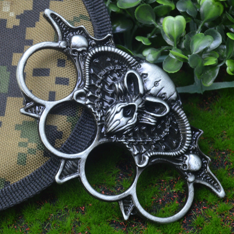 Cross-border Bull Demon King four-finger fist clasp fist ring four-finger knuckle ring Wu finger tiger hand Kui with car equipment life-saving hammer ring