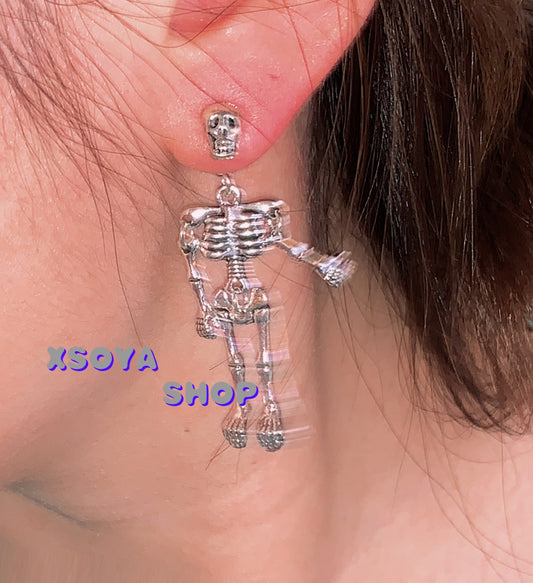 A pair of playful small stud earrings with movable hands and feet of punk INS skull